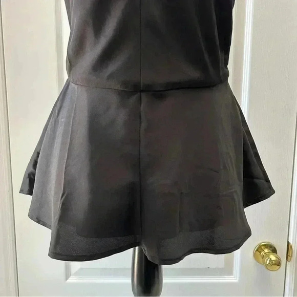 Ricki’s  Blouse Sleeveless Peplum Halter Neckline Flowy Top Black Size 0/XS NWT - Picture 6 of 14